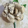 Recycled paper rose buttonholes